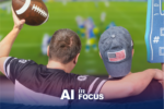 Two men
                                    sitting on the couch watching football on TV
                                    to show how AI plays a role in sports with a
                                    text overlay that reads 